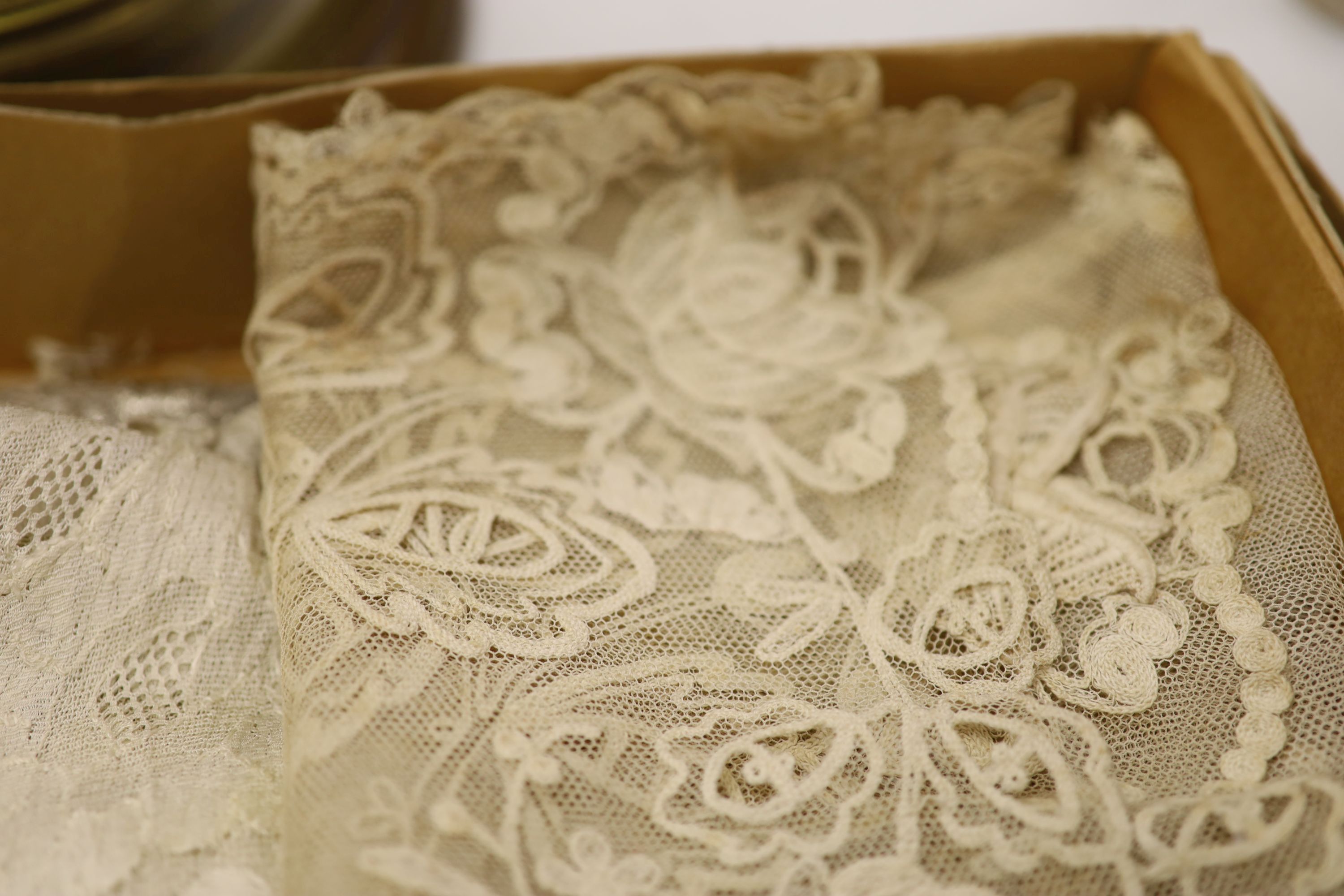 A silk lace stole, collar and Maltese collar, christening shawl, tape lace collar, a metallic gold and silver machine lace panel etc